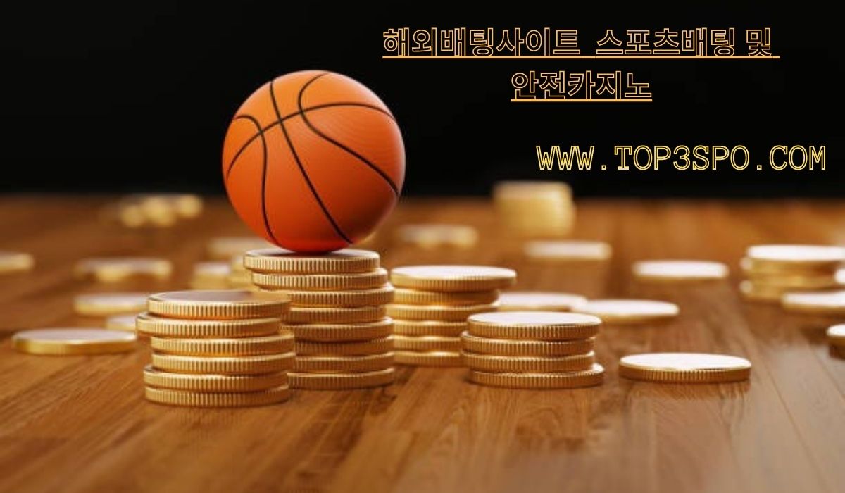 miniature of basketball at the top of a gold coins 